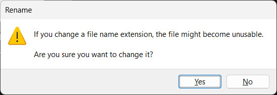 Hộp thoại cảnh báo của Windows khi thay đổi phần mở rộng tệp Excel sang zip