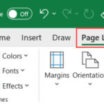 Nhấp vào thẻ page layout trên thanh công cụ Excel